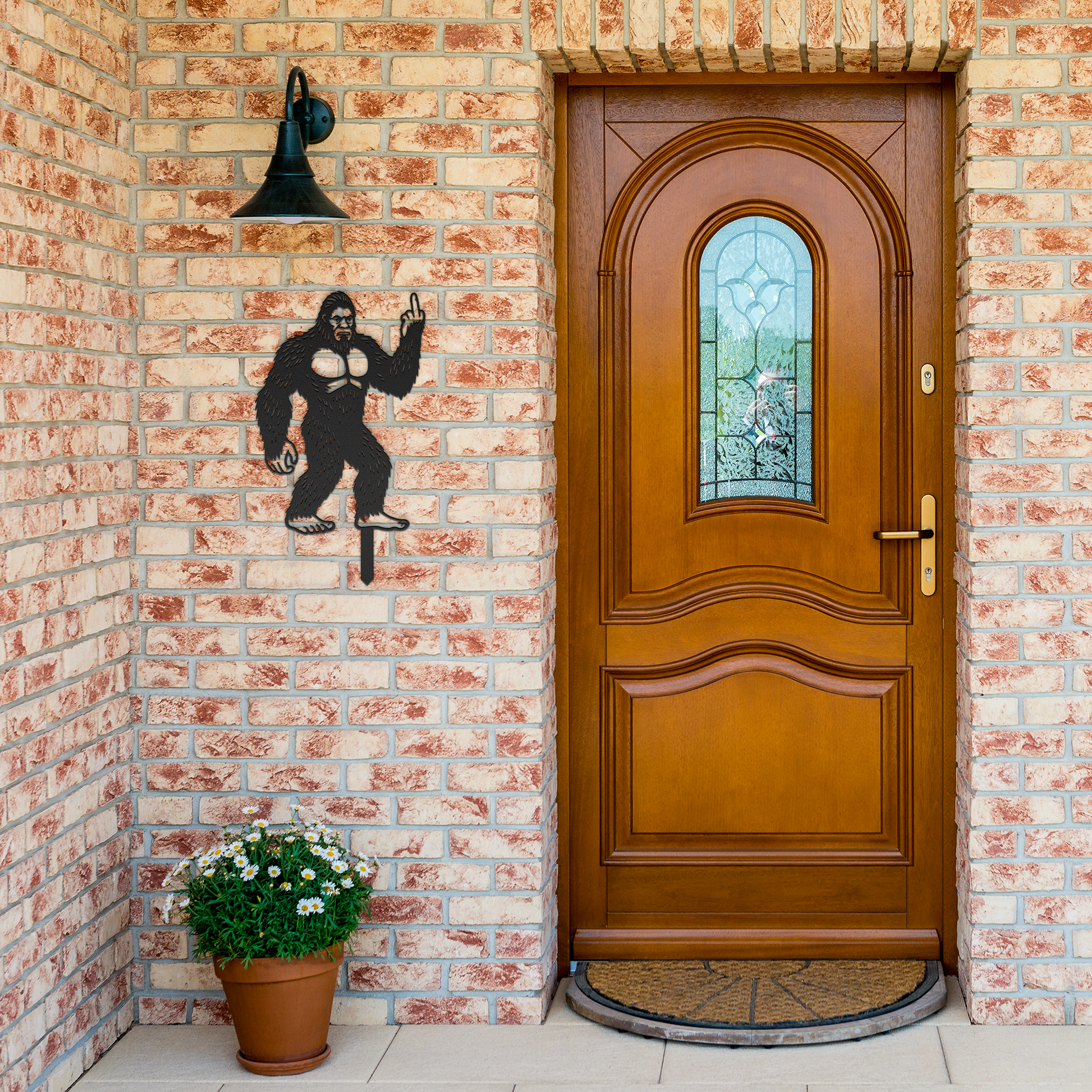 Bigfoot_Metal_Garden_Stake_Flipping_Off__Black_Brick_Entrance_Mockup.png