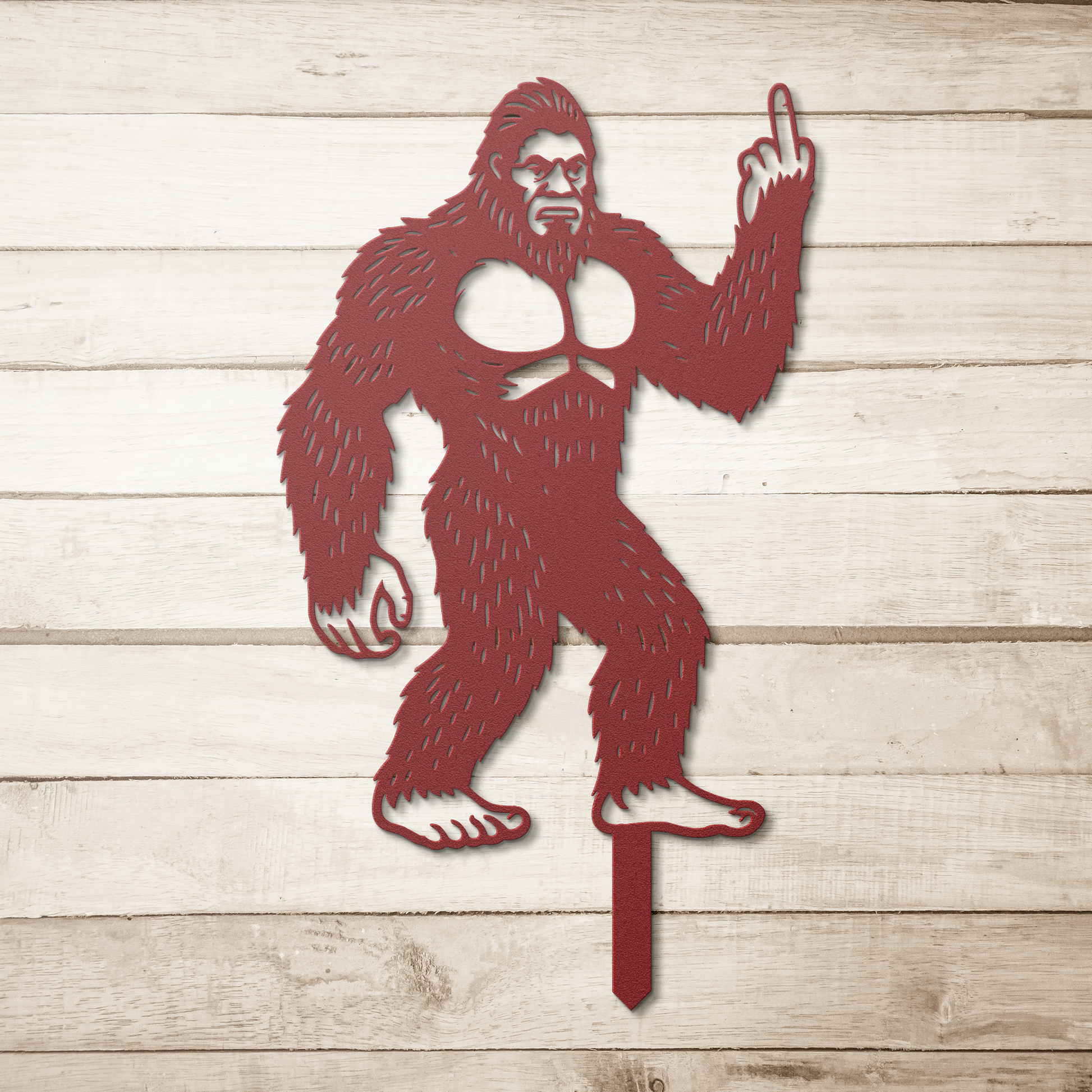 Bigfoot_Metal_Garden_Stake_Flipping_Off__Red_Simple_Wood_BKGD_Mockup.png