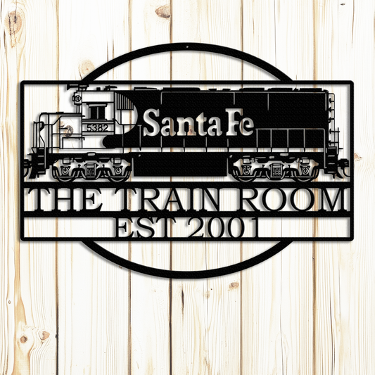 Santa Fe Train Monogram metal sign in black on rustic wood wall